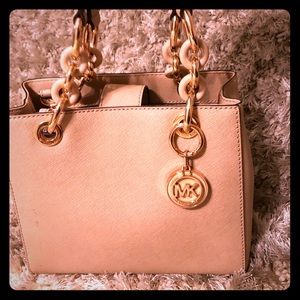 Michael Kors blush handbag with rose gold chain